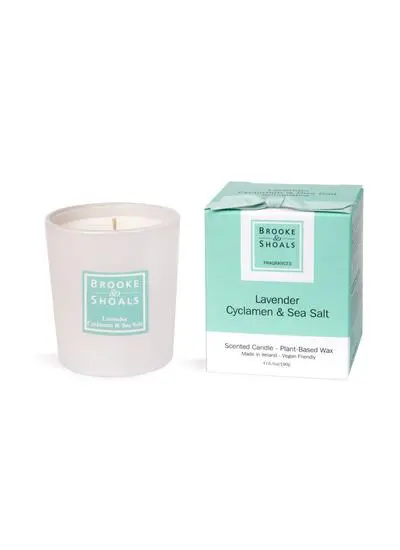 White cutout shot with Candle and Packaging